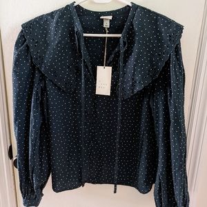 A New Day, dark green polka dot top